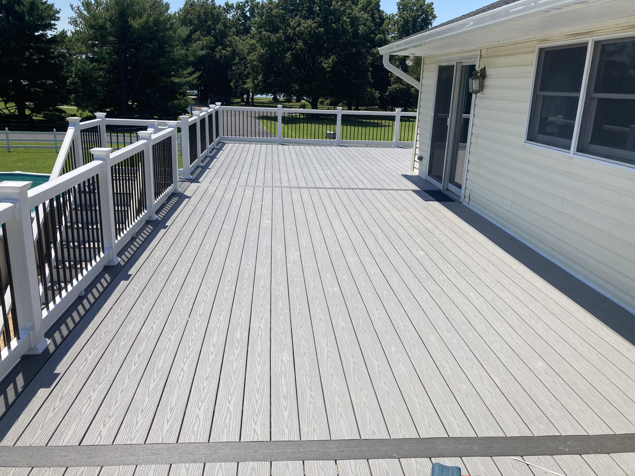 The large stunning deck installation from the previous photo wraps around the house.
