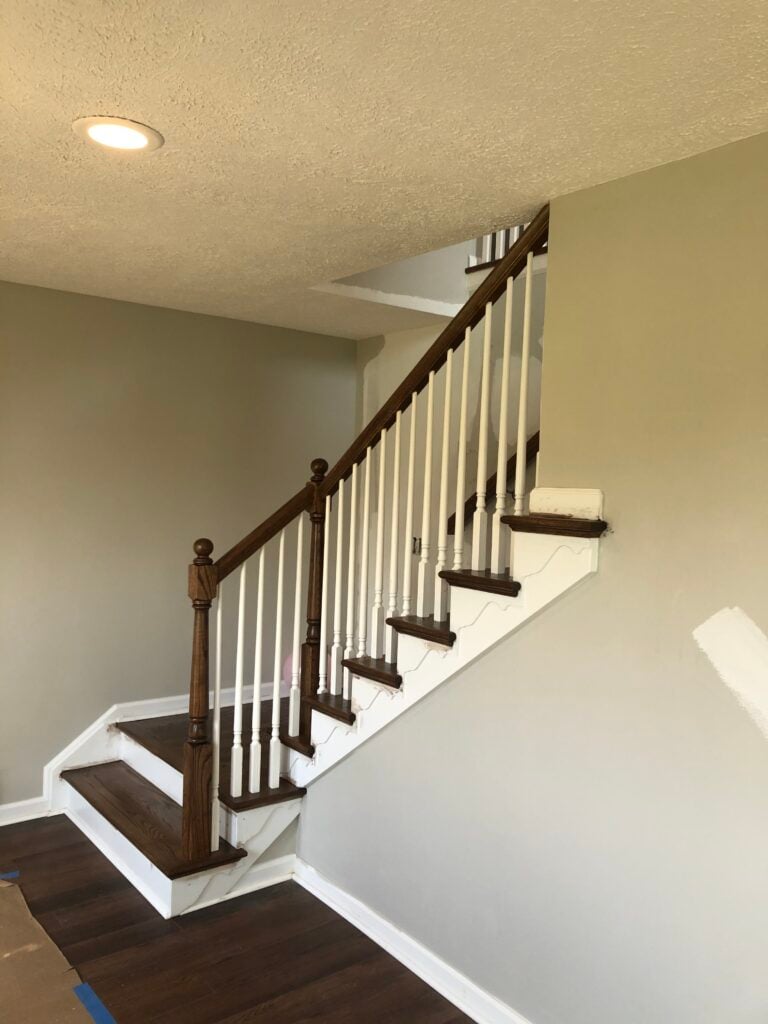 Beautifully designed and built compact stairway provides game room access