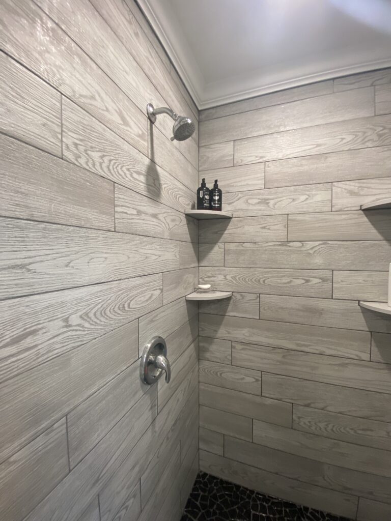 Gorgeous stone tiled shower stall
