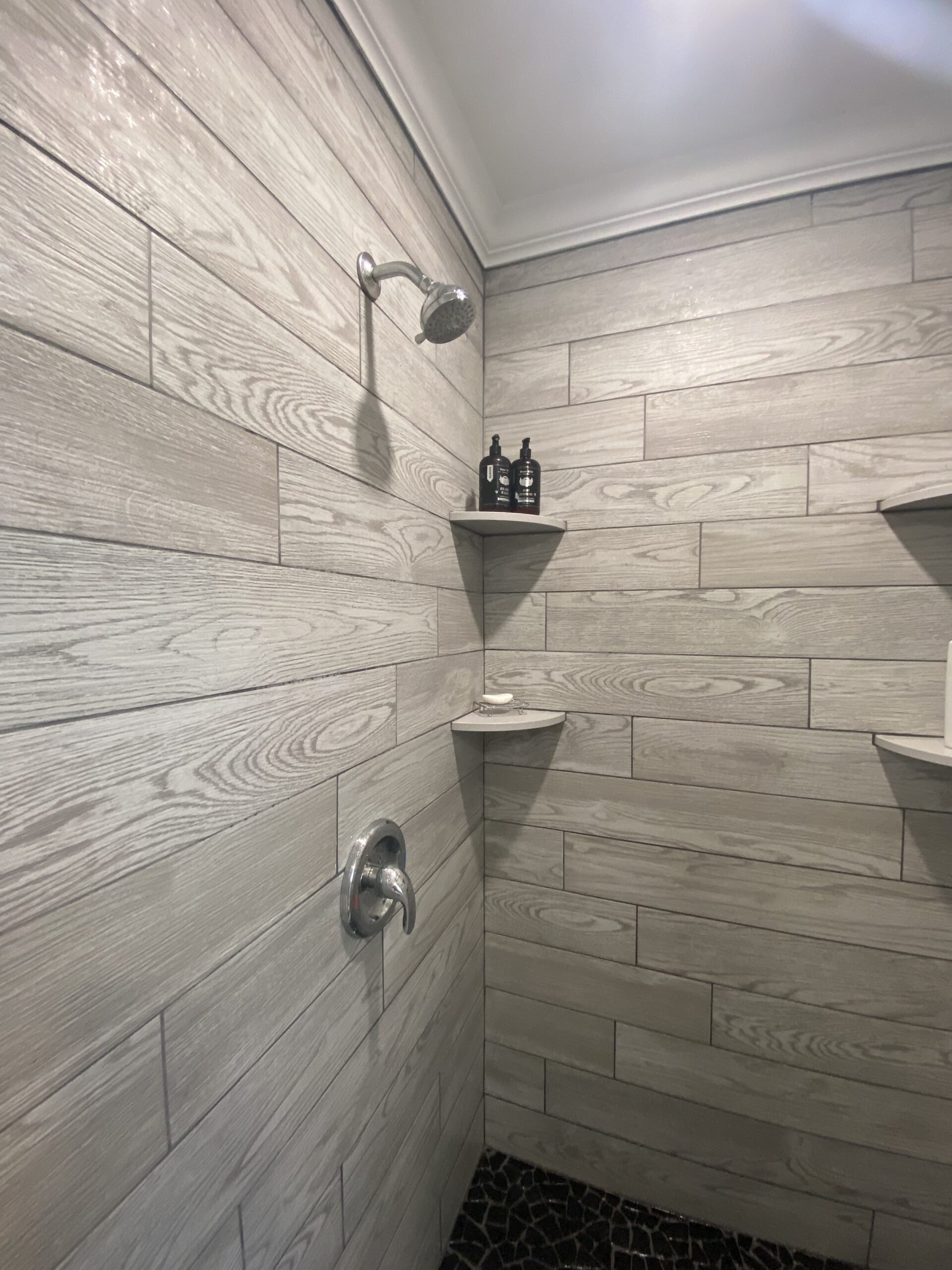 Gorgeous stone tiled shower stall