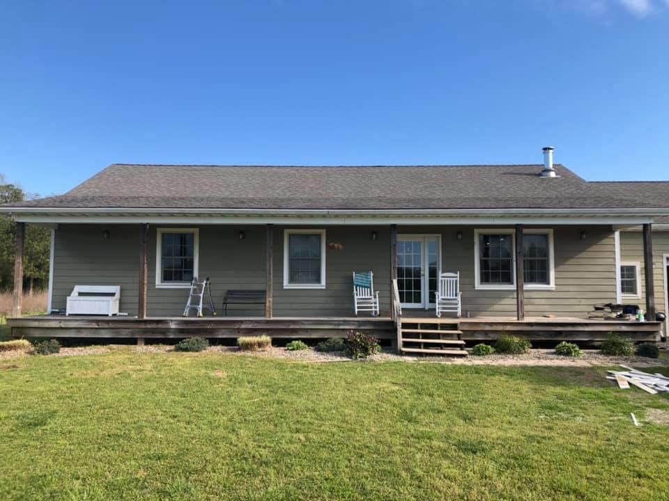 Exterior of a one level home before renovation.