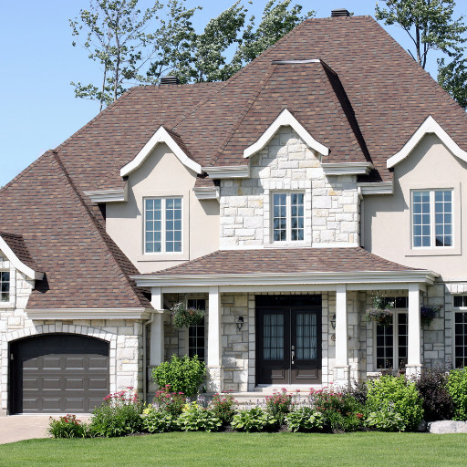 Gorgeous modern custom home with stonework and columns